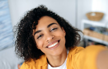 A beautiful young Afro-American woman with a perfect smile.