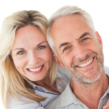 Cheerful mature couple with perfect smiles