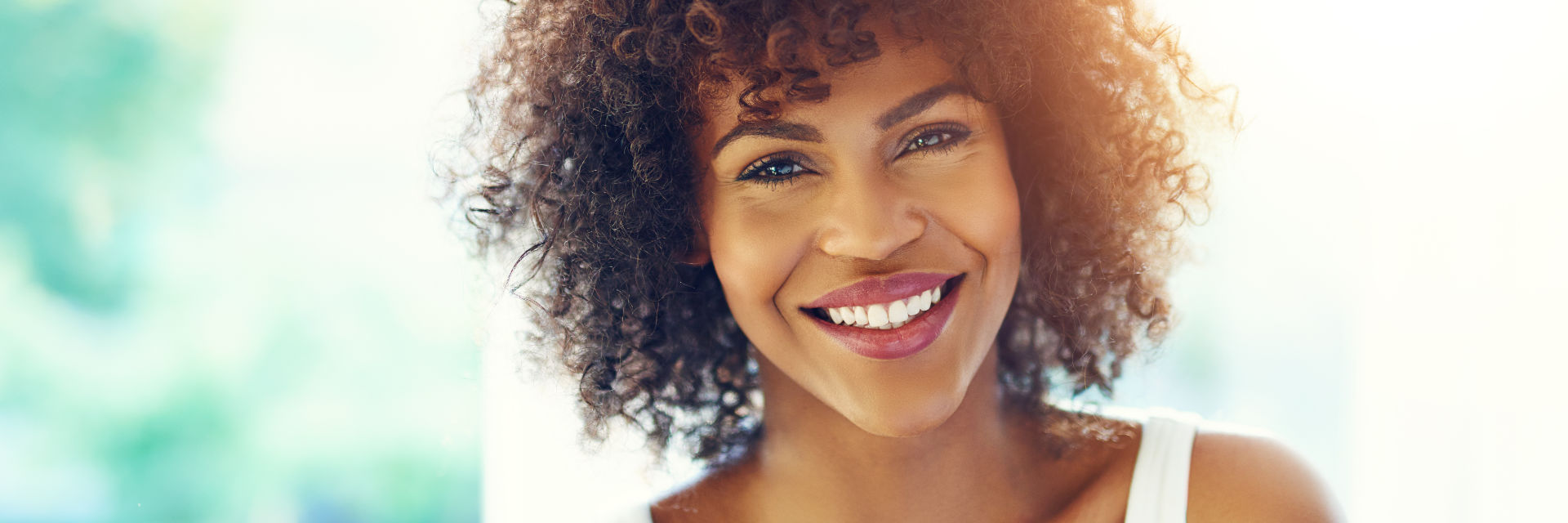 A beautiful Afro-American woman with a perfect smile.